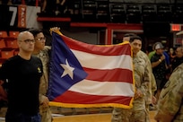 Future Soldiers take oath of enlistment at Puerto Rican basketball game