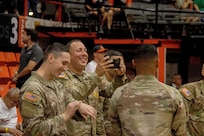 Future Soldiers take oath of enlistment at Puerto Rican basketball game