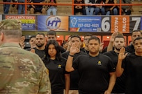 Future Soldiers take oath of enlistment at Puerto Rican basketball game