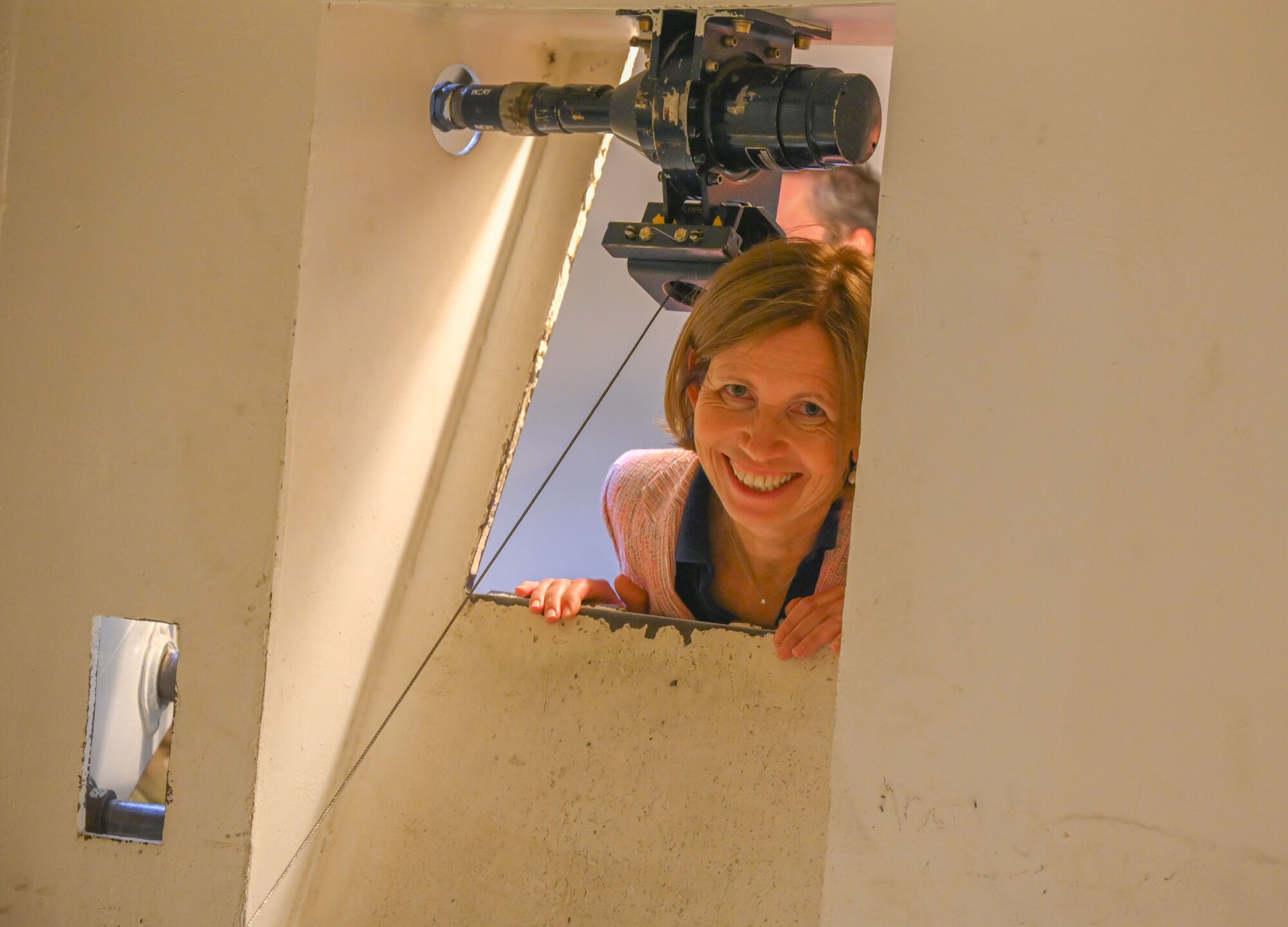 The Honorable Anniken Krutnes, Norway's Ambassador to the United States, poses for a photo during a tour of a simulated launch facility at Minot Air Force Base, North Dakota, May 30, 2024. During the tour, Krutnes learned about the mechanisms used to maintain and launch the Minuteman III Intercontinental Ballistic Missile. (U.S. Air Force photo by Airman 1st Class Trust Tate)