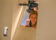 The Honorable Anniken Krutnes, Norway's Ambassador to the United States, poses for a photo during a tour of a simulated launch facility at Minot Air Force Base, North Dakota, May 30, 2024. During the tour, Krutnes learned about the mechanisms used to maintain and launch the Minuteman III Intercontinental Ballistic Missile. (U.S. Air Force photo by Airman 1st Class Trust Tate)