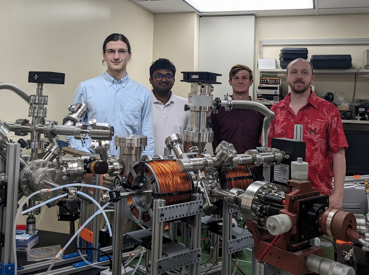 From left: Miami University students Carter Wade, Lakshan Don Manuwelge Don, Nate Price and Dr. Joseph Perry Corbett, test the newly installed ultra-high vacuum scanning tunneling microscope at Miami University in Oxford, Ohio on, May 30, 2024. The microscope was donated by the Air Force Research Laboratory Materials and Manufacturing Directorate to the Corbett Research Group as part of a recently signed Educational Partnership Agreement with Miami University. Corbett, who leads the group, is an assistant professor of physics at Miami University, and is a former AFRL materials research scientist. (Courtesy photo / Rannet Manning)