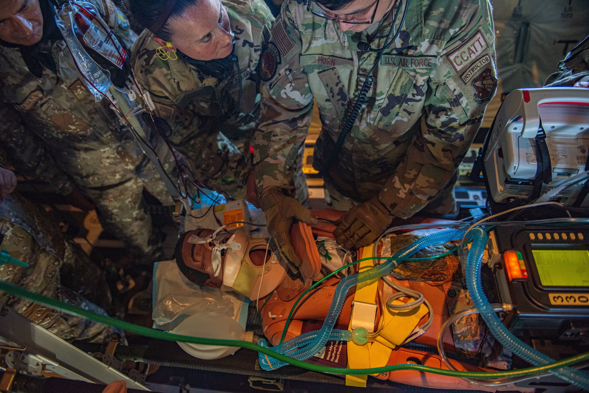 U.S. Airmen assigned to the 167th Aeromedical Evacuation Squadron and the 88th Healthcare Operations Squadron, set up a blood transfusion on a simulated aeromedical evacuation patient during Resolute Sentinel 2024 in Lima, Peru, May 30, 2024. Resolute Sentinel 24's goal is to prepare the participating nations for providing care to patients in areas where treatment options and resources are limited. (U.S. Air force photo by Airman 1st Class Sir Wyrick)