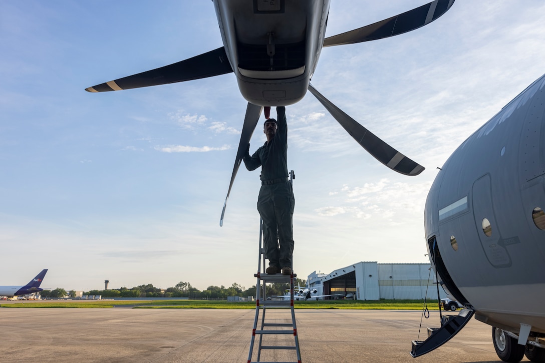 U.S. Marine Corps Lance Cpl. Luis ZornozaHermida, a native of California, and a KC-130J Hercules loadmaster with Marine Aerial Refueler Transport Squadron (VMGR) 252, conducts preflight checks at Jacksonville, Florida, May 31, 2024. VMGR-252 supported Distributed Aviation Operations Exercise 24, which is designed to distribute command and control of aviation forces across echelons of command and push authorities to the lowest levels while keeping forces moving between airfields and air sites. (U.S. Marine Corps photo by Lance Cpl. Orlanys Diaz Figueroa)