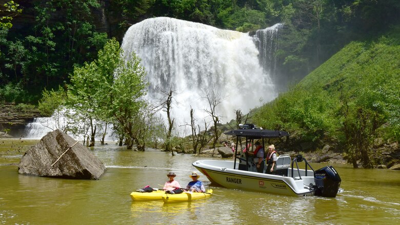 Park Rangers Remi Clark and Gary Bruce perform safety checks May 29, 2024, with Kayakers Tony and Linda Bishop at Burgess Falls on Center Hill Lake in Sparta Tennessee. (USACE Photo by Lee Roberts)