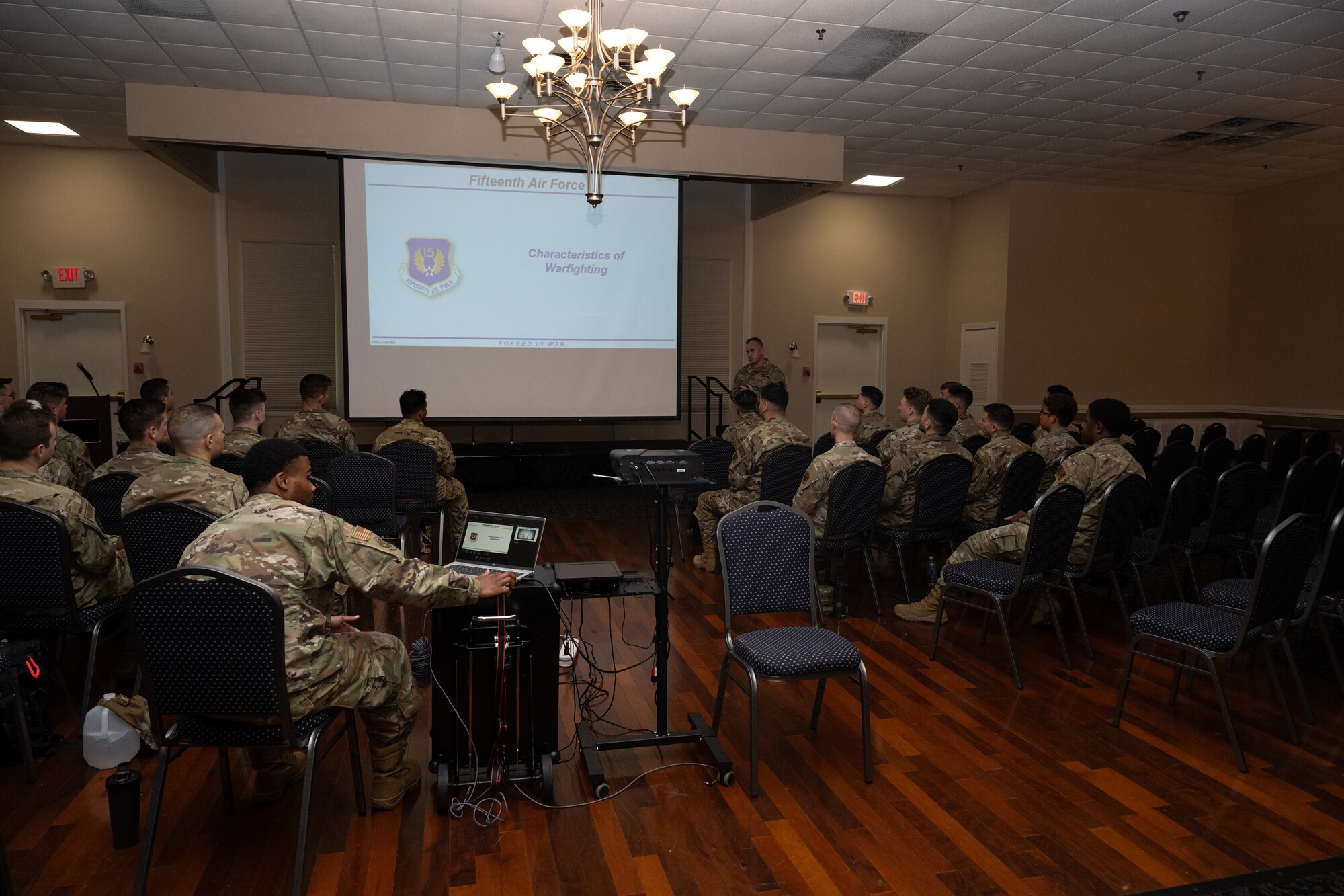 U.S. Air Force Chief Master Sgt. Jeremy Unterseher, Fifteenth Air Force command chief, conducts a briefing on the critical characteristics of effective warfighting at Seymour Johnson Air Force Base, North Carolina, May 21, 2024. Unterseher visited Seymour Johnson AFB to get a first-hand look at the 4th Fighter Wing’s infrastructure, day to day operations and meet Airman on base. (U.S. Air Force photo by Airman Megan Cusmano)