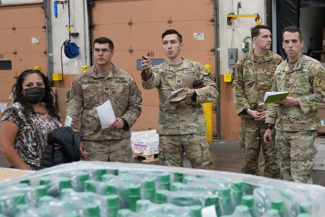 People in warehouse.
