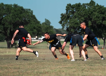 Brahmas athletes and Army North Soldiers play flag football