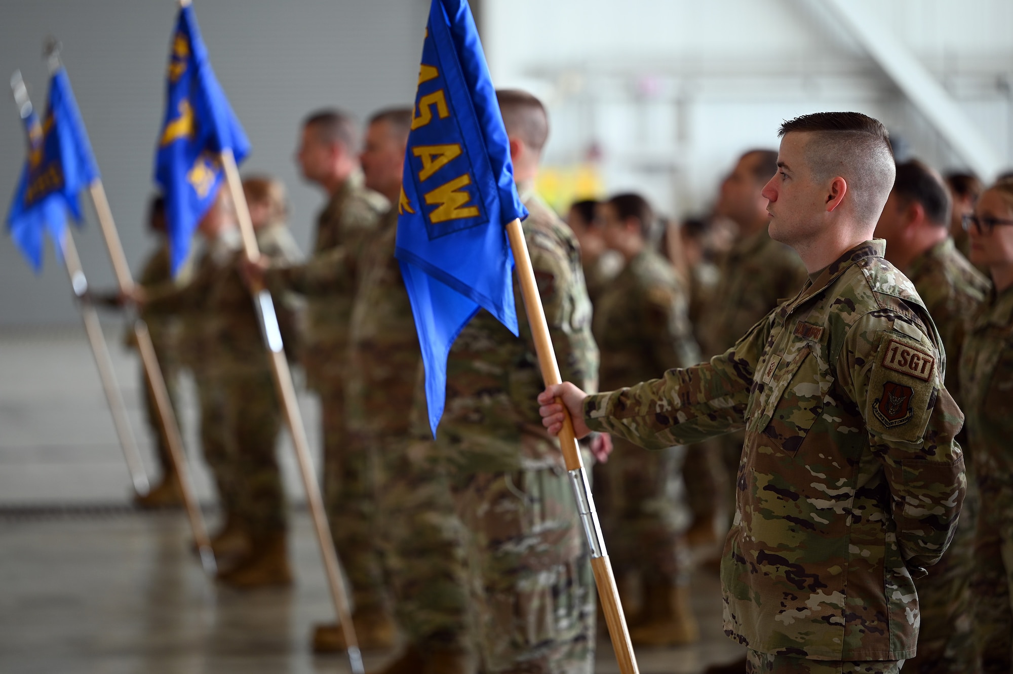 445th Airlift Wing Reserve Citizen Airmen stand in formation during the 445th Airlift Wing Assumption of Command Ceremony held at Wright-Patterson Air Force Base, Ohio June 1, 2024. Col. Douglas Perry, Jr., assumed command of the wing after serving as the commander of the 434th Operations Group, Grissom Air Reserve Base, Indiana. (U.S. Air Force photo/Master Sgt. Patrick O’Reilly)