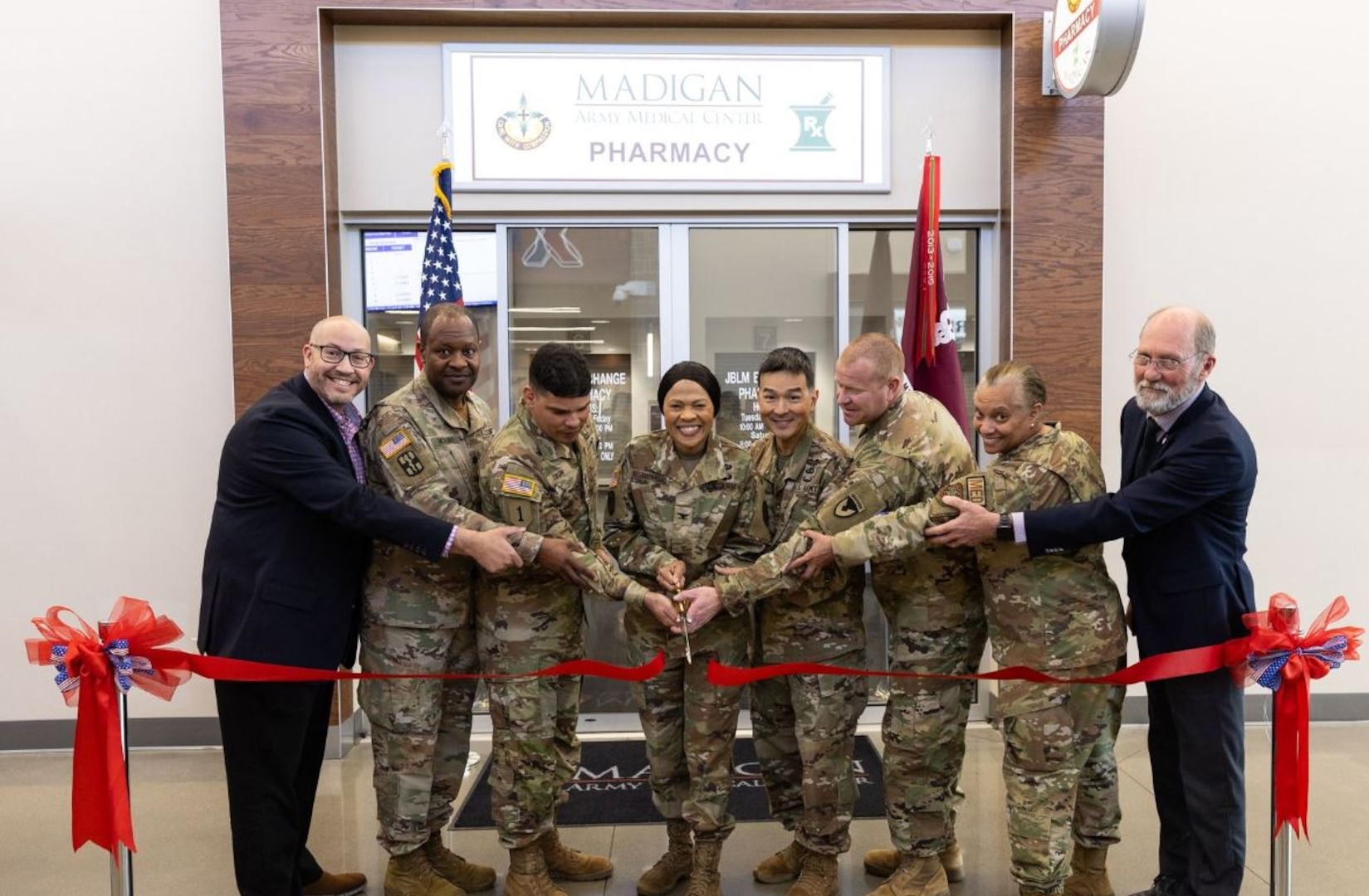 On 16 April 2024, Madigan Army Medical Center and the JBLM Community championed the Grand Re-opening of the Lewis Main Exchange Refill-Pharmacy with a ribbon-cutting ceremony. This refill-only dispensing center at the PX will increase access to care and serve as the primary method of obtaining refill prescriptions for the JBLM Community. The PX site will decrease the current refill turn-around time by 50%, while allowing the Main Hospital Pharmacy to increase its capacity to serve outpatients. 
Madigan’s Commander, Col. Hope M. Williamson-Younce, delivered a keynote speech praising the Department of Pharmacy’s vision, innovation, courage, and transformation efforts to keep our sacred responsibility of care to our Service Members, Veterans, and their Families.