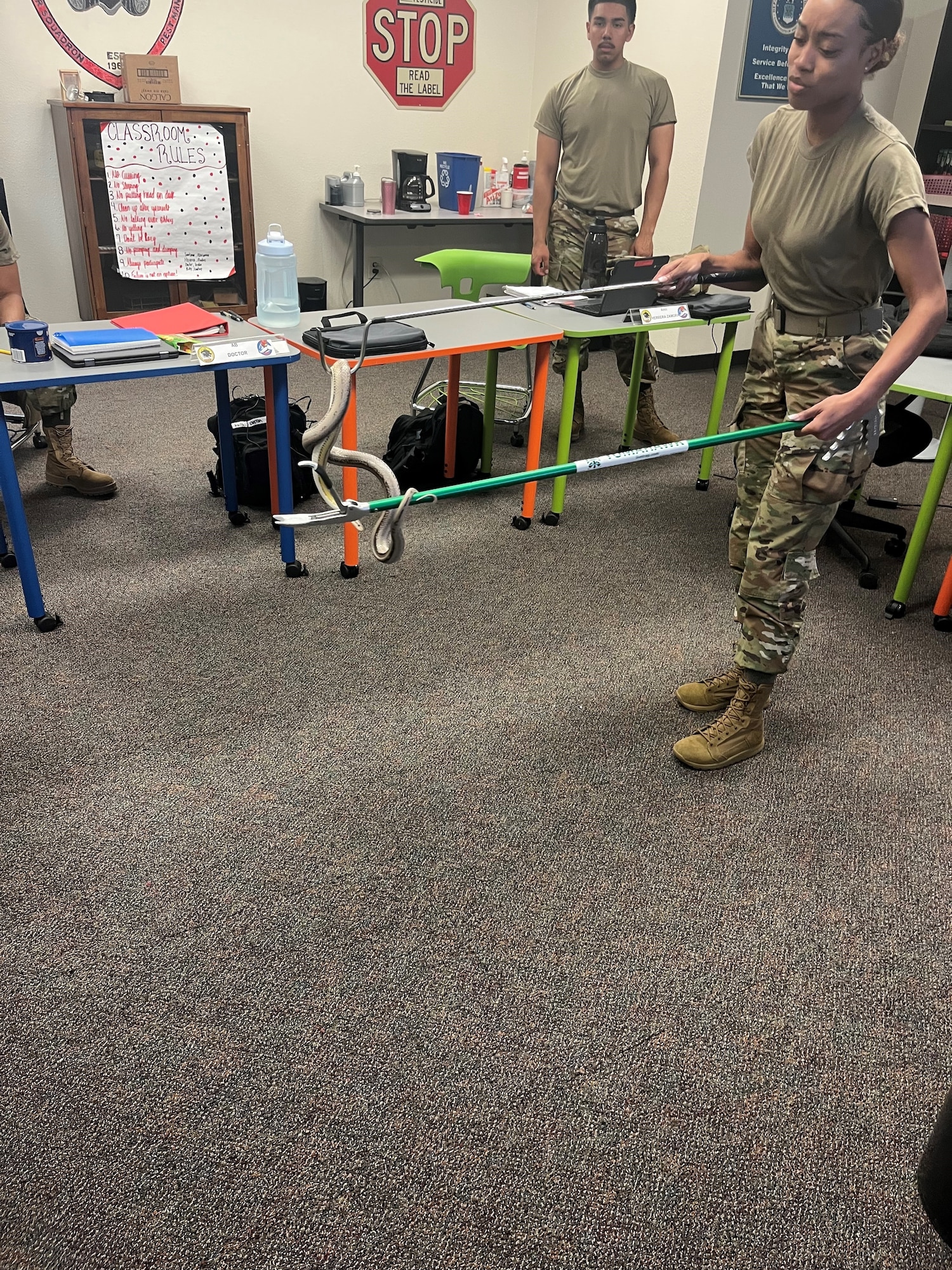 Airmen in Training work on equipment