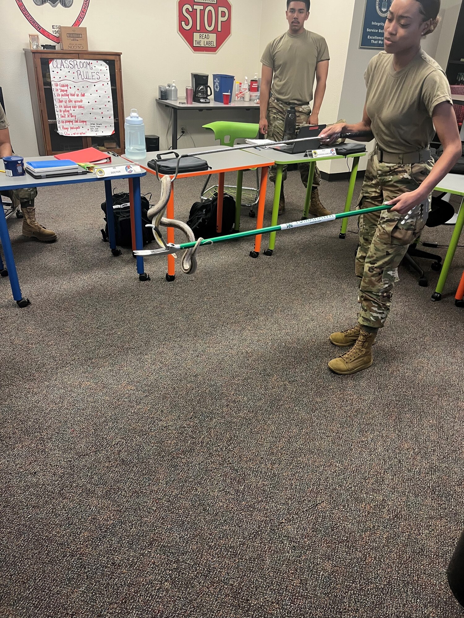 Airmen in Training work on equipment