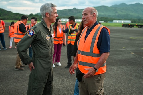 Lt. Col. Matt Menendez, 68th Airlift Squadron chief pilot and Reach 2087 aircraft commander, talks with Pastor Ron Spradlin on the tarmac at Panama Pacifico International Airport, just outside Panama City, Panama June 1, 2024.