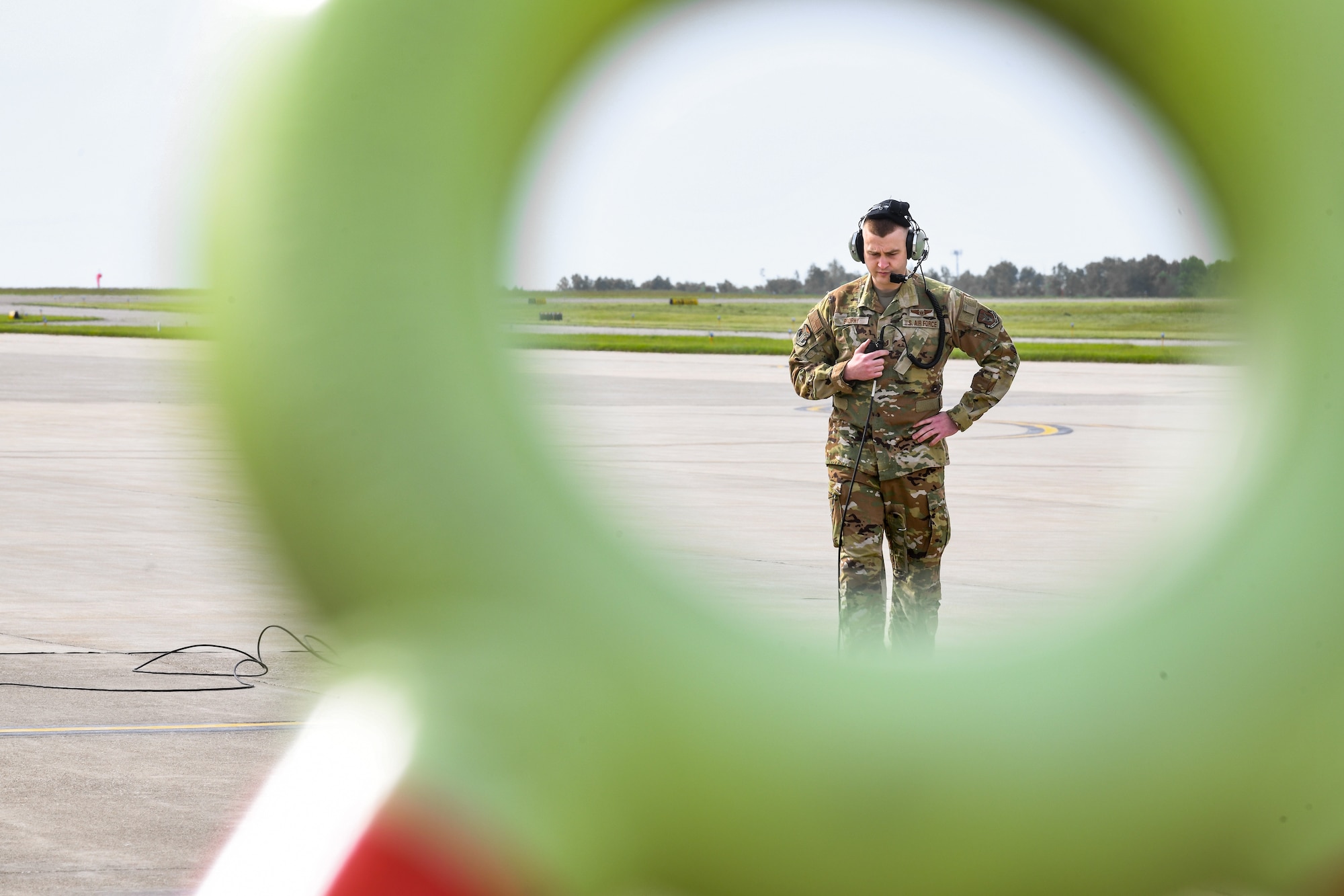 Tech. Sgt. Rayne Brophy, a loadmaster with the 757th Airlift Squadron, listens to preflight checklists procedures between aircrew prior to takeoff at Youngstown Air Reserve Station, Ohio, June 1, 2024.