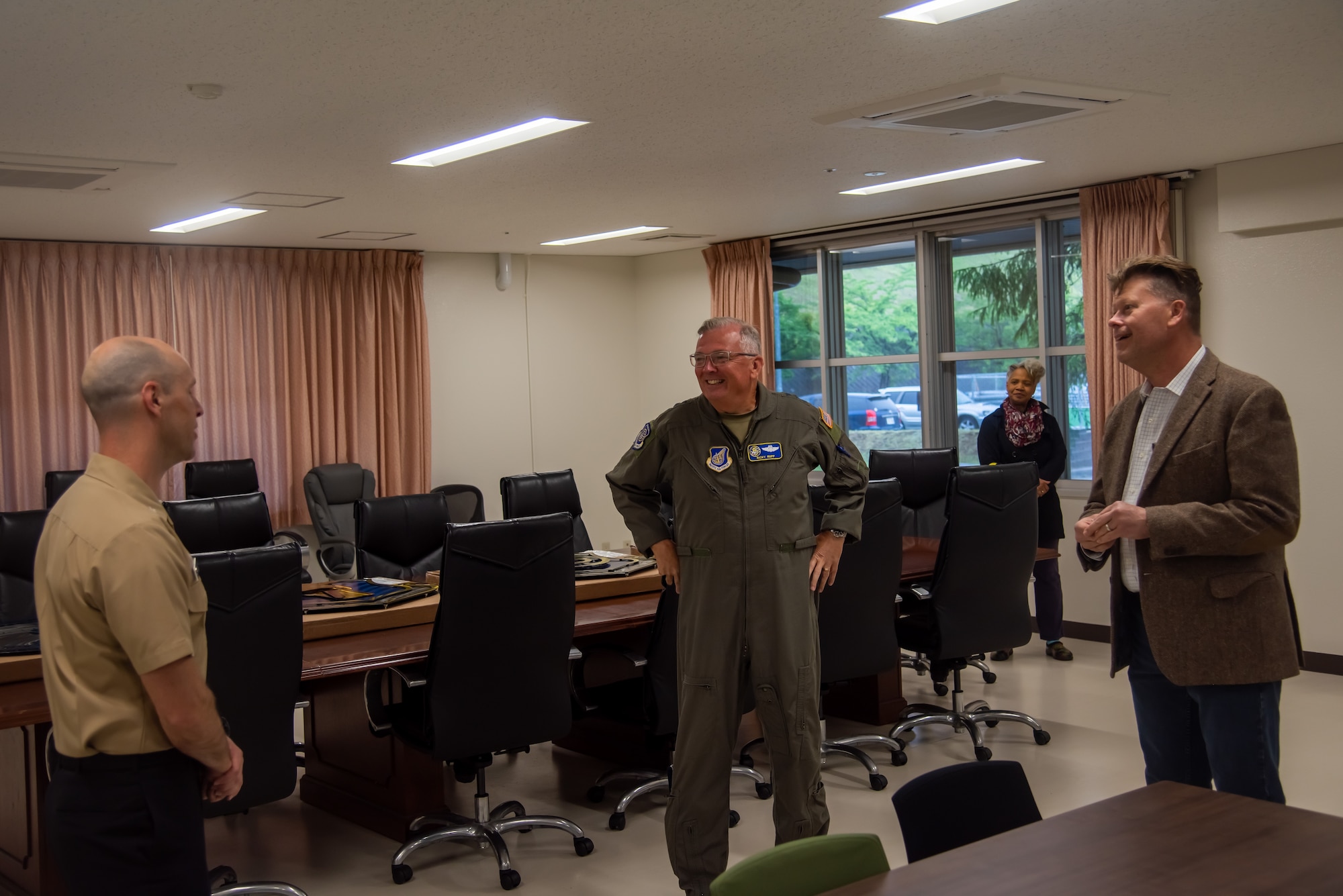 U.S. Air Force Lt Gen. Ricky Rupp, U.S. Forces Japan and 5th Air Force commander, center, talks to members of helping agencies during a visit to Tower 220 at Misawa Air Base, Japan, Jun. 3, 2024.