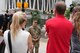 Army Col. in camouflage uniform gives interview to news reporters outdoors in Atlanta.