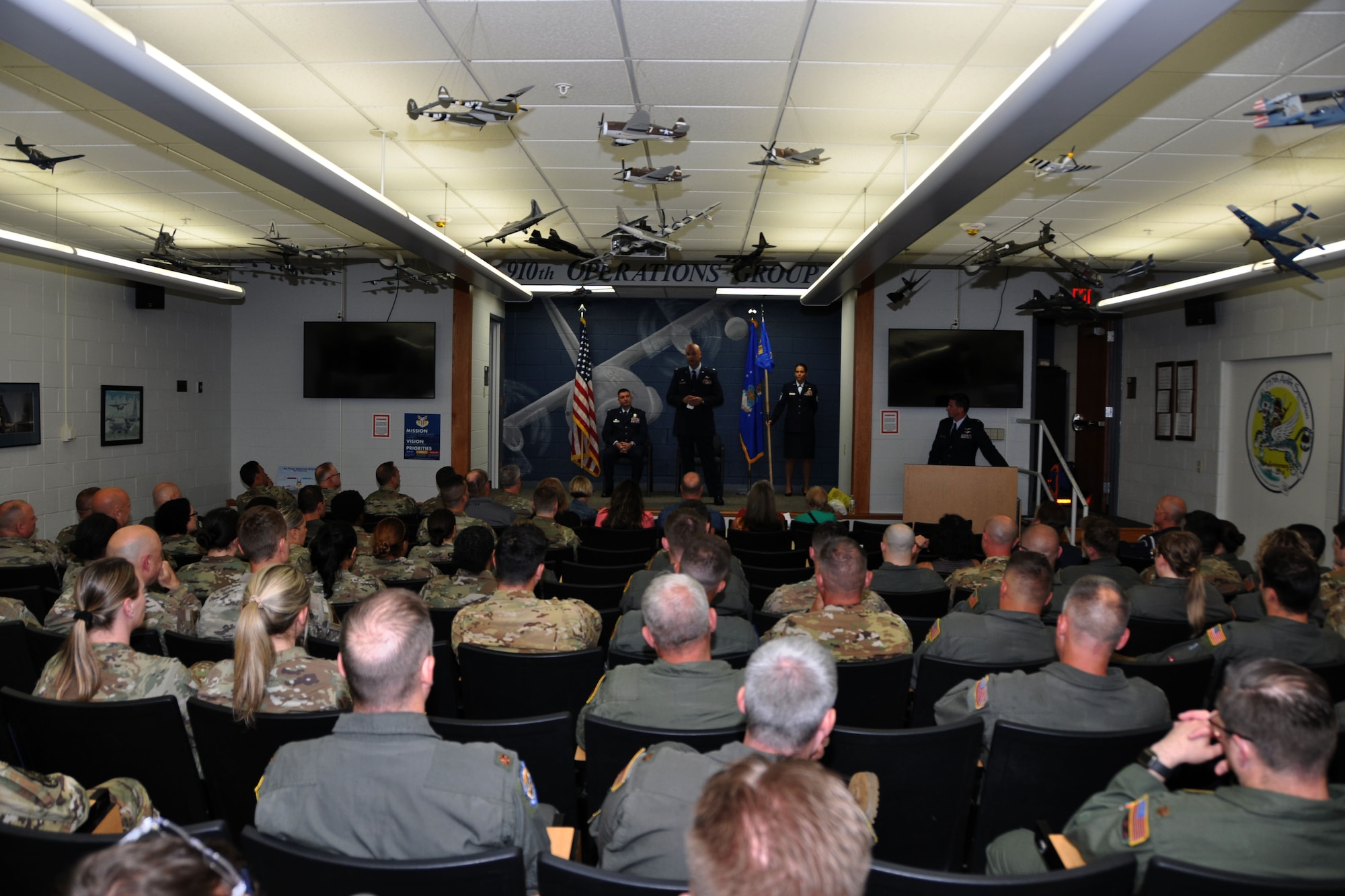 Lt. Col. Brian Hodor, 757th Airlift Squadron commander, addresses the audience during an Assumption of Command ceremony, held in the 910th Operations Group Aircrew Briefing room at Youngstown Air Reserve Station, Ohio, June 1, 2024.