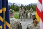 Alaska Army National Guardsmen with the 49th Personnel Detachment, known as the 49th Theater Gateway, gather for a deployment ceremony at Camp Carroll on Joint Base Elmendorf-Richardson, Alaska, June 1, 2024. The 49th TG will deploy to the Middle East to support Operation Spartan Shield.