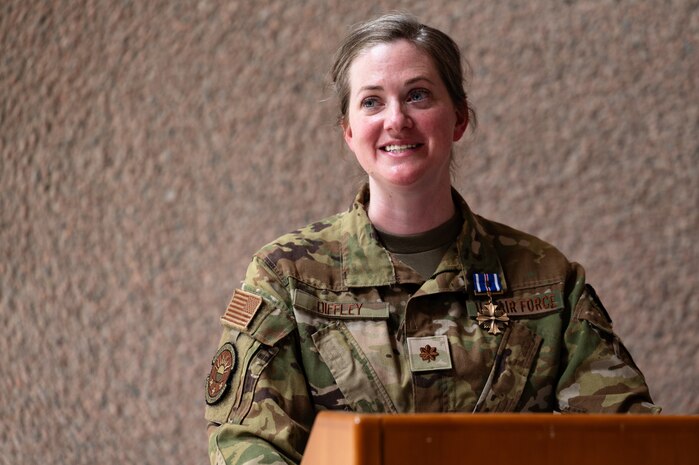 U.S. Air Force Maj. Shannon Diffley, the 99th Inpatient Operations Squadron critical care unit flight commander, delivers a speech during a ceremony at Nellis Air Force Base, Nevada, June 3, 2024.