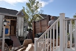 Movers unload household goods of a service member in Mechanicsburg, Pennsylvania. (US Navy photo by Russell Stewart)