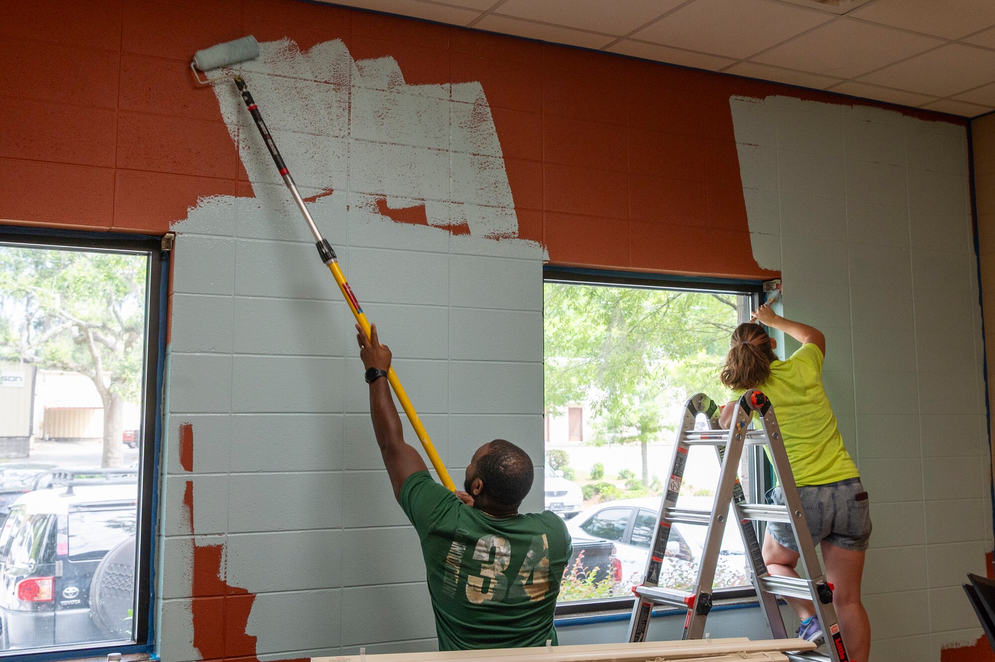 U.S. Air Force Airmen assigned to the 23rd Wing paint a classroom at Boys and Girls Club in Valdosta, Georgia, May 31, 2024. The BCG of Valdosta serve over 1,000 children and teens daily across five high-traffic sites. (U.S. Air Force photo by Airman 1st Class Leonid Soubbotine)