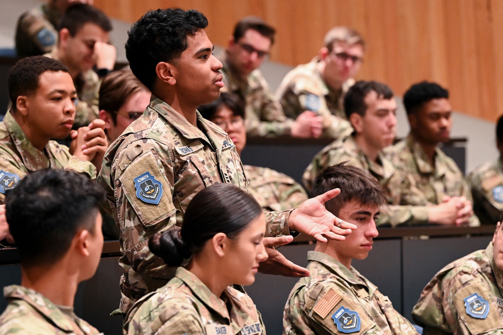 A cadet asks a question to U.S. Space Force Maj. Gen. Tim Sejba, Commander of Space Training and Readiness Command, during the first day of the Azimuth program at the U.S. Air Force Academy, in Colorado Springs, Colo., June 3, 2024. Azimuth is a unique summer program for U.S. Air Force Academy cadets as well as Navy and Army cadets, and ROTC students considering a commission in the U.S. Space Force. Azimuth is a three-week joint undergraduate nationwide space education and training program. Azimuth’s overall goal is to inspire men and women to become officers of character, motivated to lead in the Space Force. (U.S. Air Force photo by Capt. Charles Rivezzo)