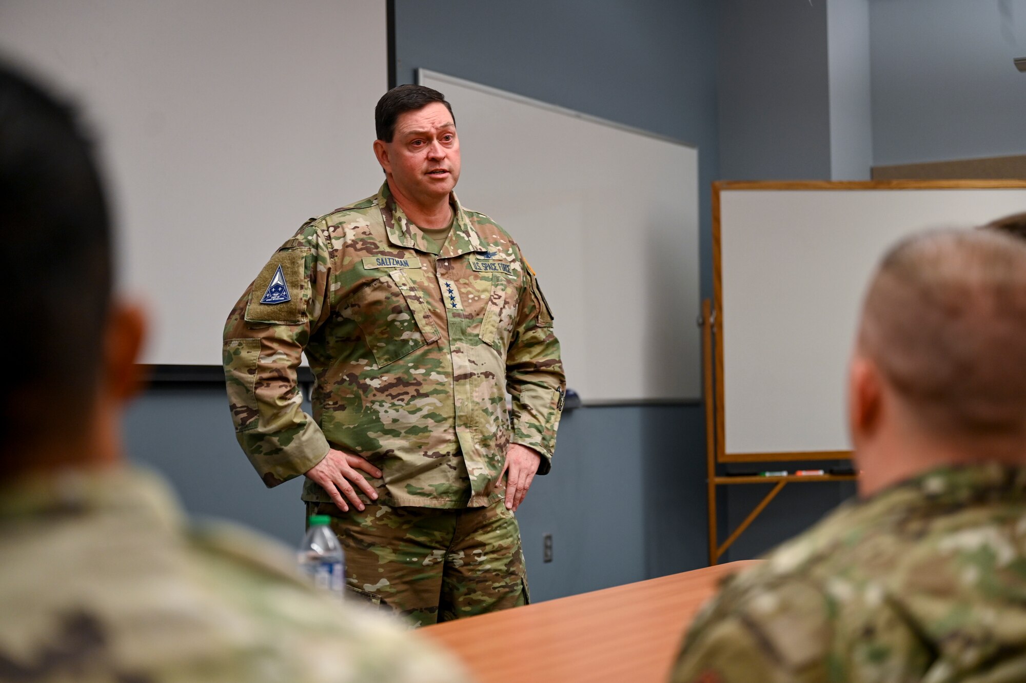 U.S. Space Force Chief of Space Operations Gen. Chance Saltzman converses with students attending the Enlisted Undergraduate Space Training course at Peterson Space Force Base, Colo., May 31, 2024. Hosted by Space Delta 1, EUST lays the groundwork for a career in space operations, covering a broad spectrum of space topics to include military space history, space policy, orbital mechanics, and cyberspace operations. (U.S. Air Force photo by Capt. Charles Rivezzo)