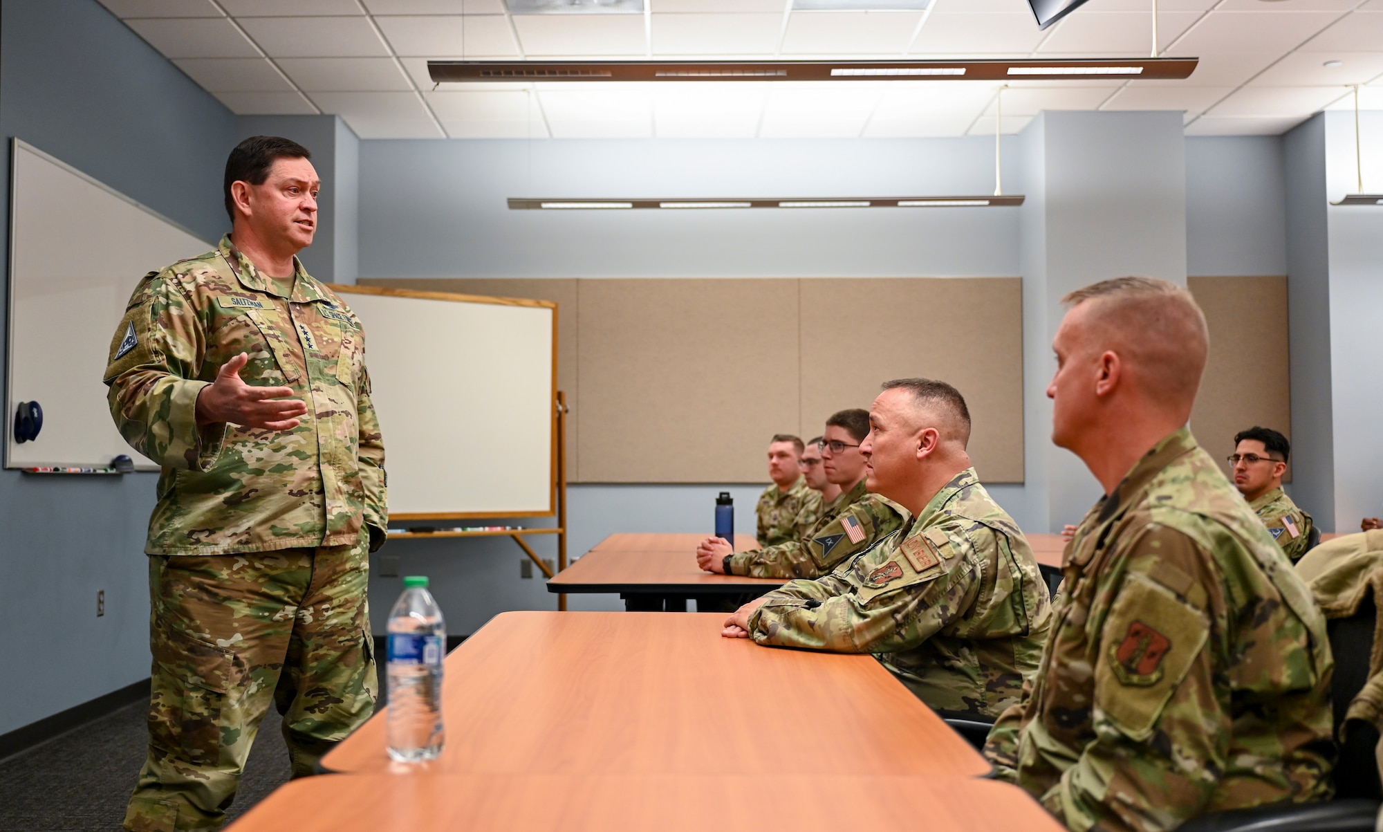 U.S. Space Force Chief of Space Operations Gen. Chance Saltzman converses with students attending the Enlisted Undergraduate Space Training course at Peterson Space Force Base, Colo., May 31, 2024. Hosted by Space Delta 1, EUST lays the groundwork for a career in space operations, covering a broad spectrum of space topics to include military space history, space policy, orbital mechanics, and cyberspace operations. (U.S. Air Force photo by Capt. Charles Rivezzo)