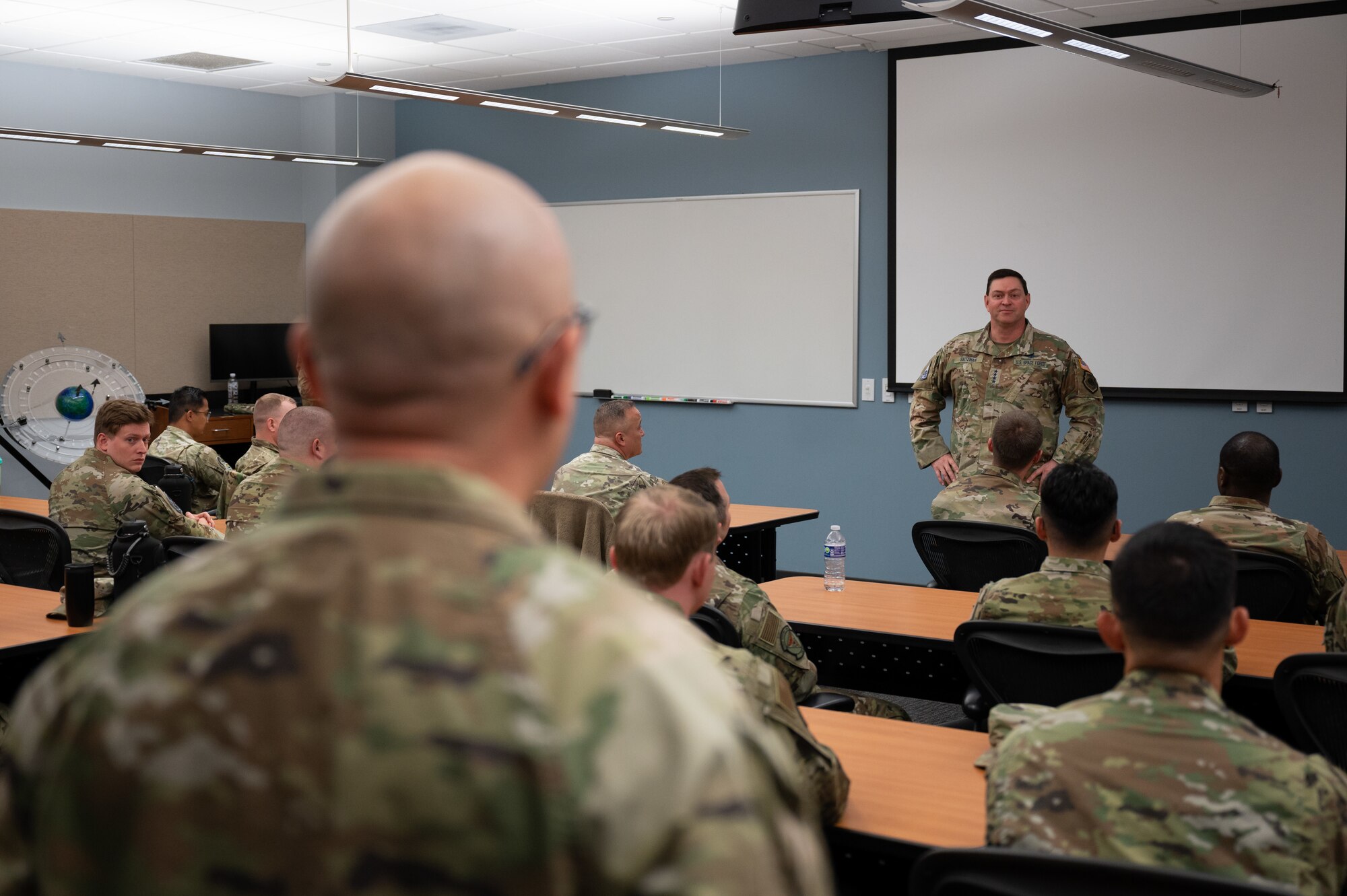 U.S. Space Force Chief of Space Operations Gen. Chance Saltzman converses with students attending the Enlisted Undergraduate Space Training course at Peterson Space Force Base, Colo., May 31, 2024. Hosted by Space Delta 1, EUST lays the groundwork for a career in space operations, covering a broad spectrum of space topics to include military space history, space policy, orbital mechanics, and cyberspace operations. (U.S. Air Force photo by Tech. Sgt. Kirsten Brandes)