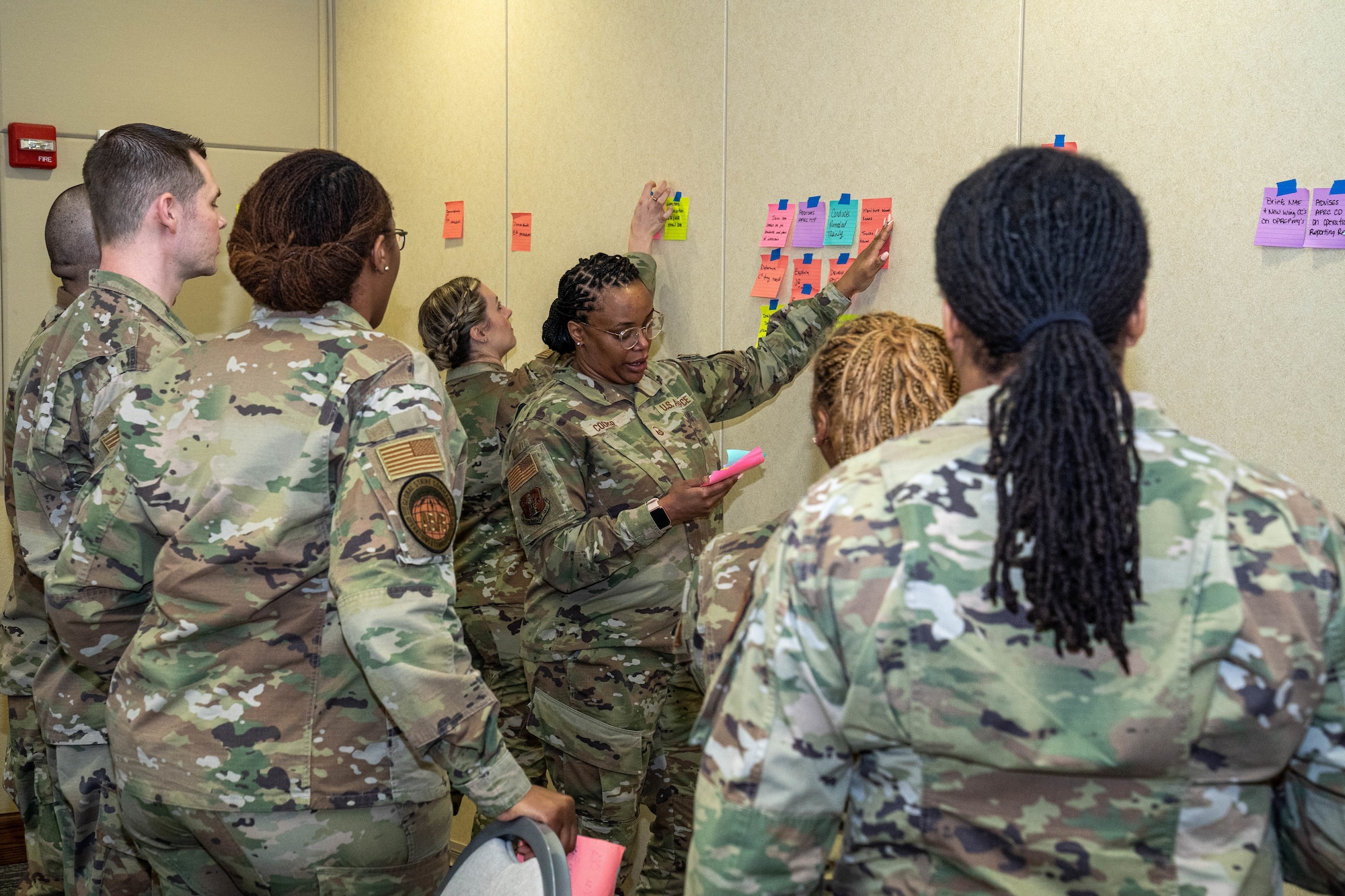 Airmen work together during a group exercise at the occupational competency seminar on Keesler Air Force Base, Mississippi, March 19, 2024.