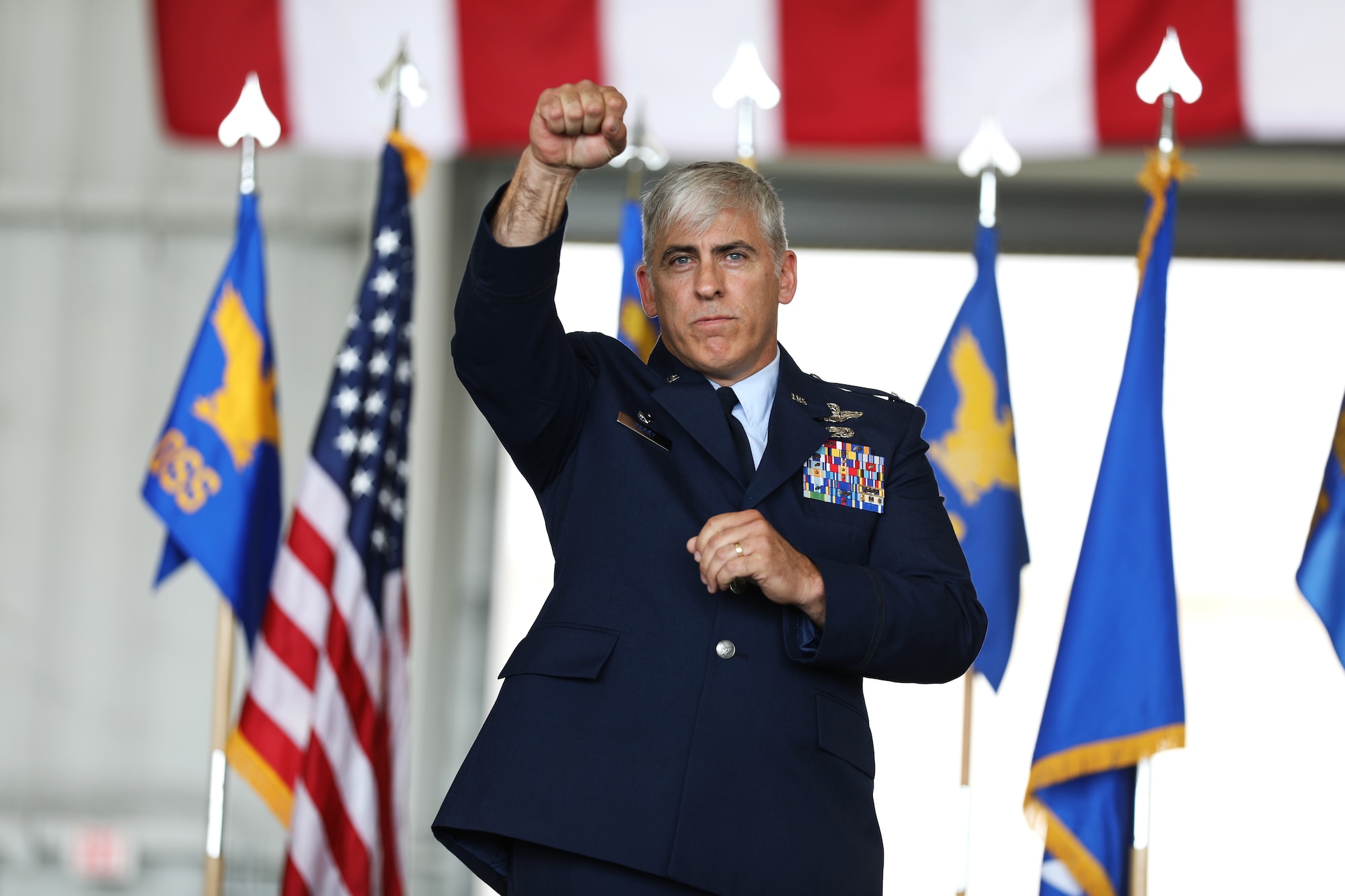 U.S. Air Force Col. Douglas A. Perry, 445th Airlift Wing commander, commends Airmen during the wing’s assumption of command ceremony at Wright-Patterson Air Force Base, Ohio, June 1, 2024. Perry is a command pilot with more than 4,900 total flying hours. (Photo by Senior Airman Angela Jackson)