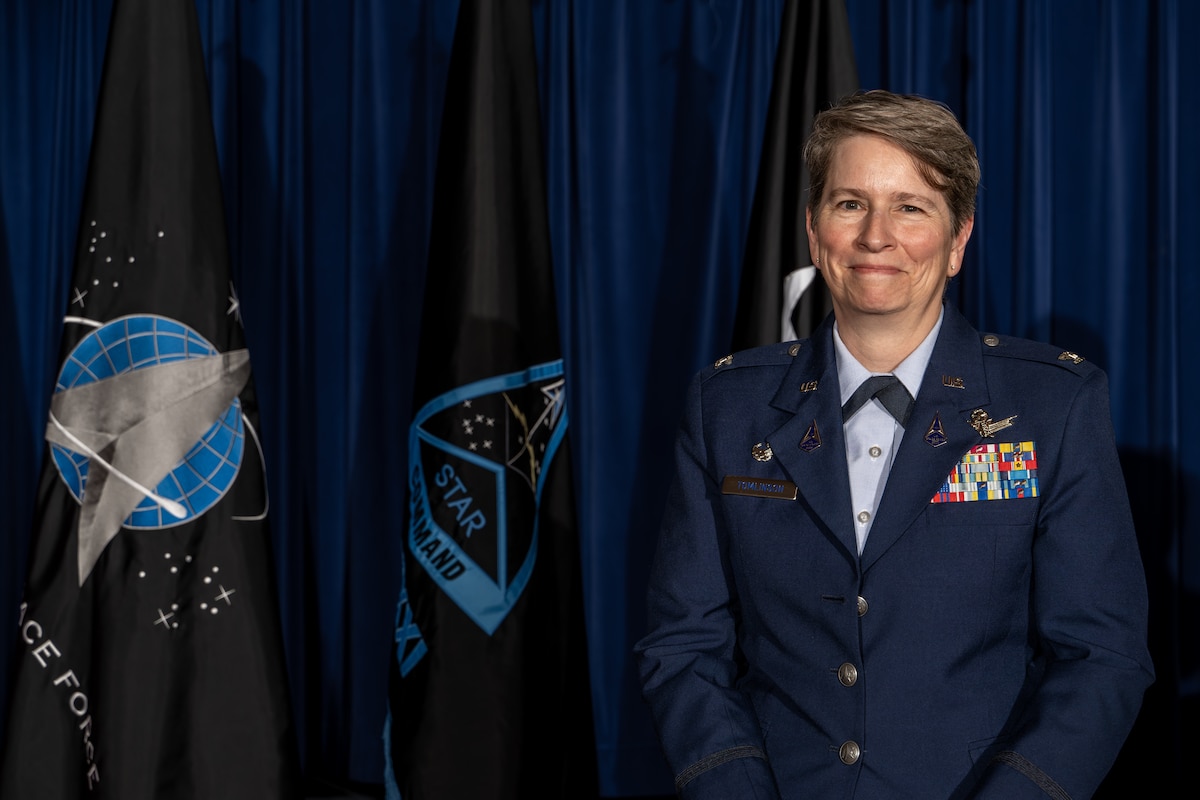 U.S. Space Force Col. Sacha Tomlinson poses for a photo after assuming command of Space Delta 12 during a change of command ceremony at Peterson Space Force Base, Colo., May 31, 2024. As the commander of Delta 12, Tomlinson leads the integrated test and evaluation of U.S. Space Force capabilities to rapidly field combat-credible weapon systems and tactics. (U.S. Space Force photo by Dalton Prejeant)