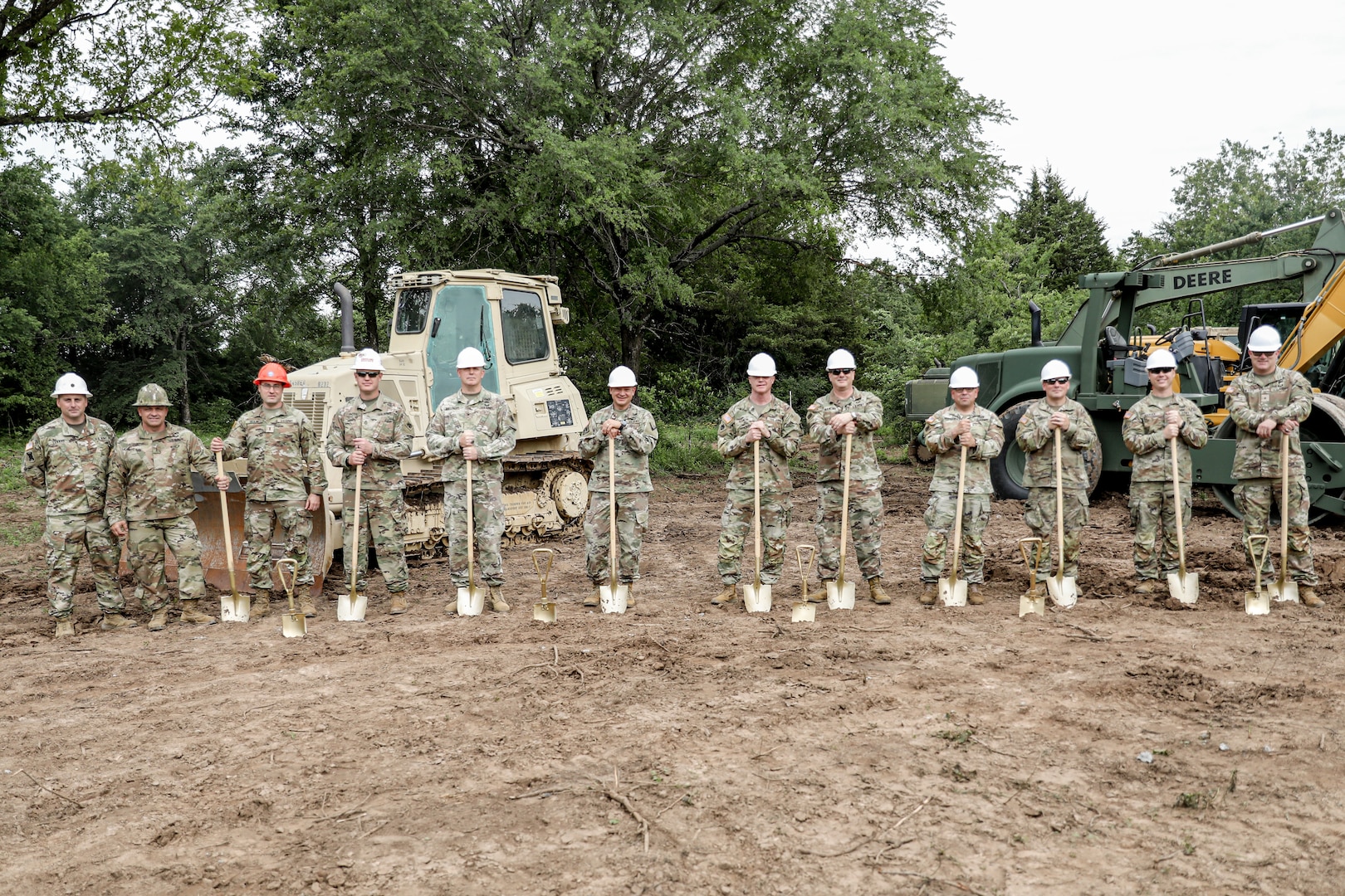 Leaders from the Oklahoma National Guard pose for a photo before breaking ground on the Oklahoma National Guard’s new one-way attack trench warfare lane at Camp Gruber Training Center, Oklahoma on June 2, 2024. After reviewing how the war in Ukraine has developed over the last two years, Oklahoma National Guard leadership elected to construct a trench warfare lane to ensure its Citizen-Soldiers are ready to face large-scale combat operations against near-peer enemies like Russia and China. (Oklahoma National Guard photo by Sgt. Conner McBride)
