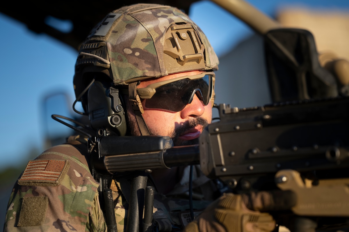 Senior Airman Julio Lopez, a 821st Contingency Response Squadron fire team member, provides entry control point security during Exercise HADES SENTINEL at Fort Hunter-Liggett in Jolon, California, May 9, 2023.