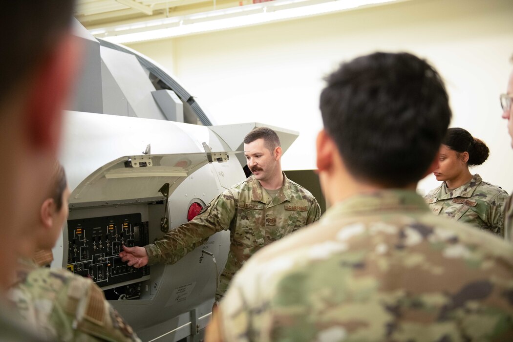 An instructor teaching Airmen about aircraft fuel operations