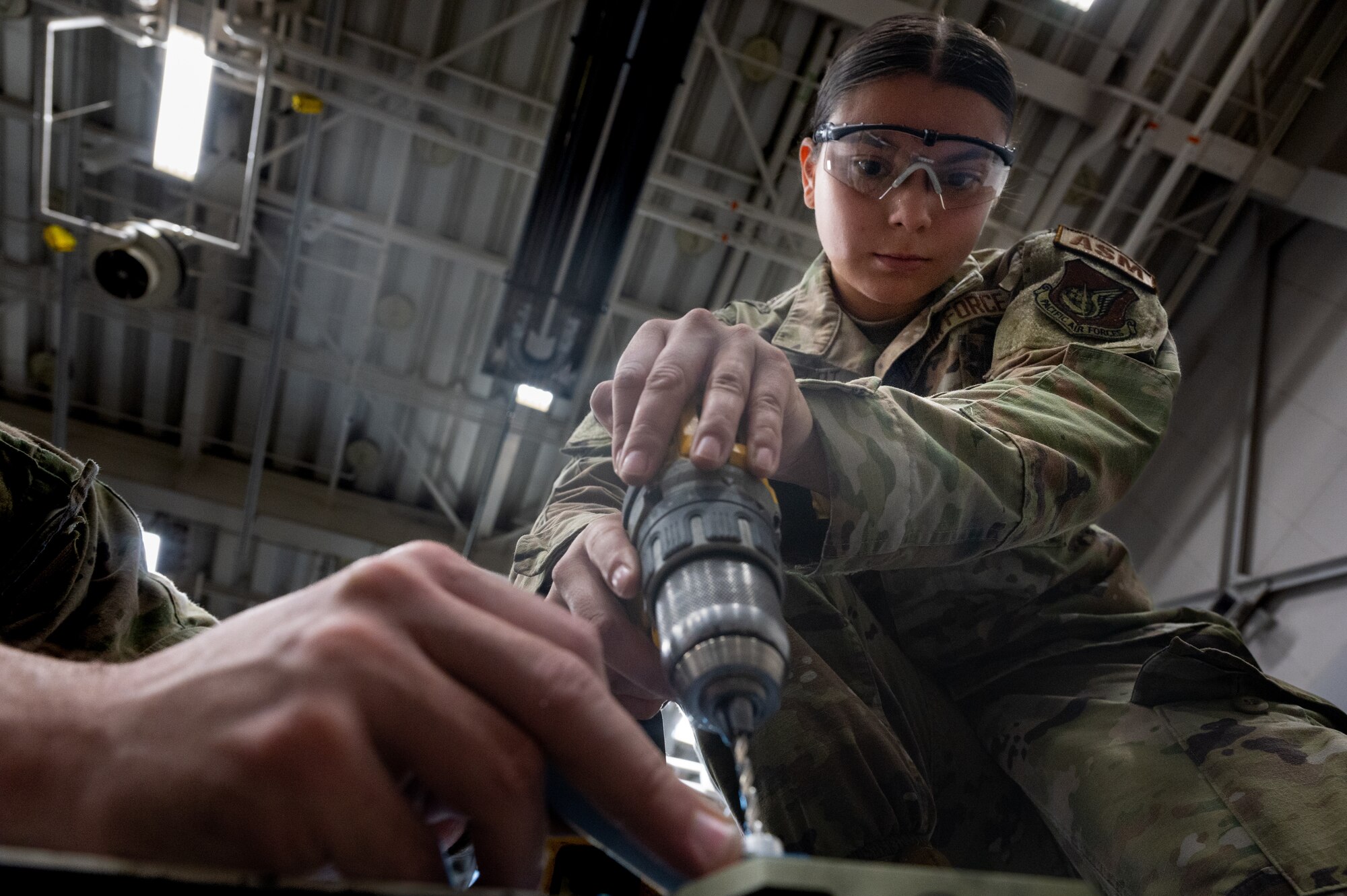 U.S. Air Force Airman Mya Camelot, 35th Maintenance Squadron aircraft structural maintenance apprentice, performs an aircraft maintenance procedure as part of her training at Misawa Air Base, Japan, May 28, 2024.
