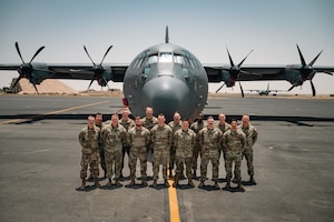 Service members from the 41st Mission Generation Force Element pose for a group photo.