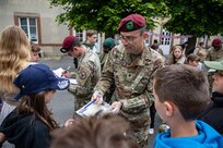 Paratroopers visit students in France during D-Day anniversary events