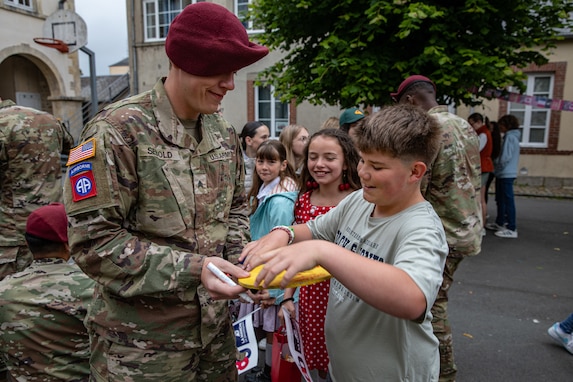 Paratroopers visit students in France during D-Day anniversary events