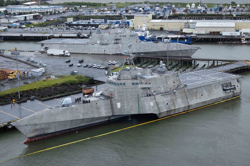 USS Montgomery (LCS 8), front, and USS Augusta (LCS 34) are in port in Astoria, Oregon.