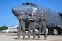 Bomber crew stands in front of a B-52H Stratofortress