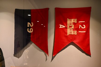 Guidons for the 121st Engineer Battalion and 29th Infantry Division are on display in the District of Columbia National Guard Museum, at the D.C. Armory, June 5, 2024. Three D.C. National Guard units landed on Omaha Beach and fought in the Battle of Normandy or Operation Overlord (D-Day): The 29th Military Police Platoon (MP PLT), Headquarters and Headquarters Company (HHC) of the 29th Infantry Division (29ID), and the 121st Engineer Combat Battalion (ECB).