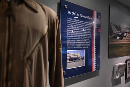 A plaque hangs in the District of Columbia National Guard Museum highlighting the lineage of the 113th Wing, District of Columbia Air National Guard, June 5, 2024. Eight District of Columbia National Guard units mobilized for service in Europe, the Pacific and at home, in support of World War II.