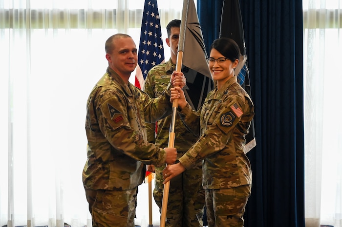 U.S. Space Force Lt. Col. Latasha L. Spear, former division chief of joint fires and information operations, Space Delta 5, Space Forces-Space, Vandenberg Space Force Base, California takes command of the 5th Space Operations Squadron during the activation ceremony at the Bolling Club on Joint Base Anacostia-Bolling in Washington, D.C., June 3, 2024. The mission of the 5th SOPS is to operate reusable, unmanned space test platforms to demonstrate technologies for the U.S. Space Force. (U.S. Air Force photo by Airman Shanel Toussaint)