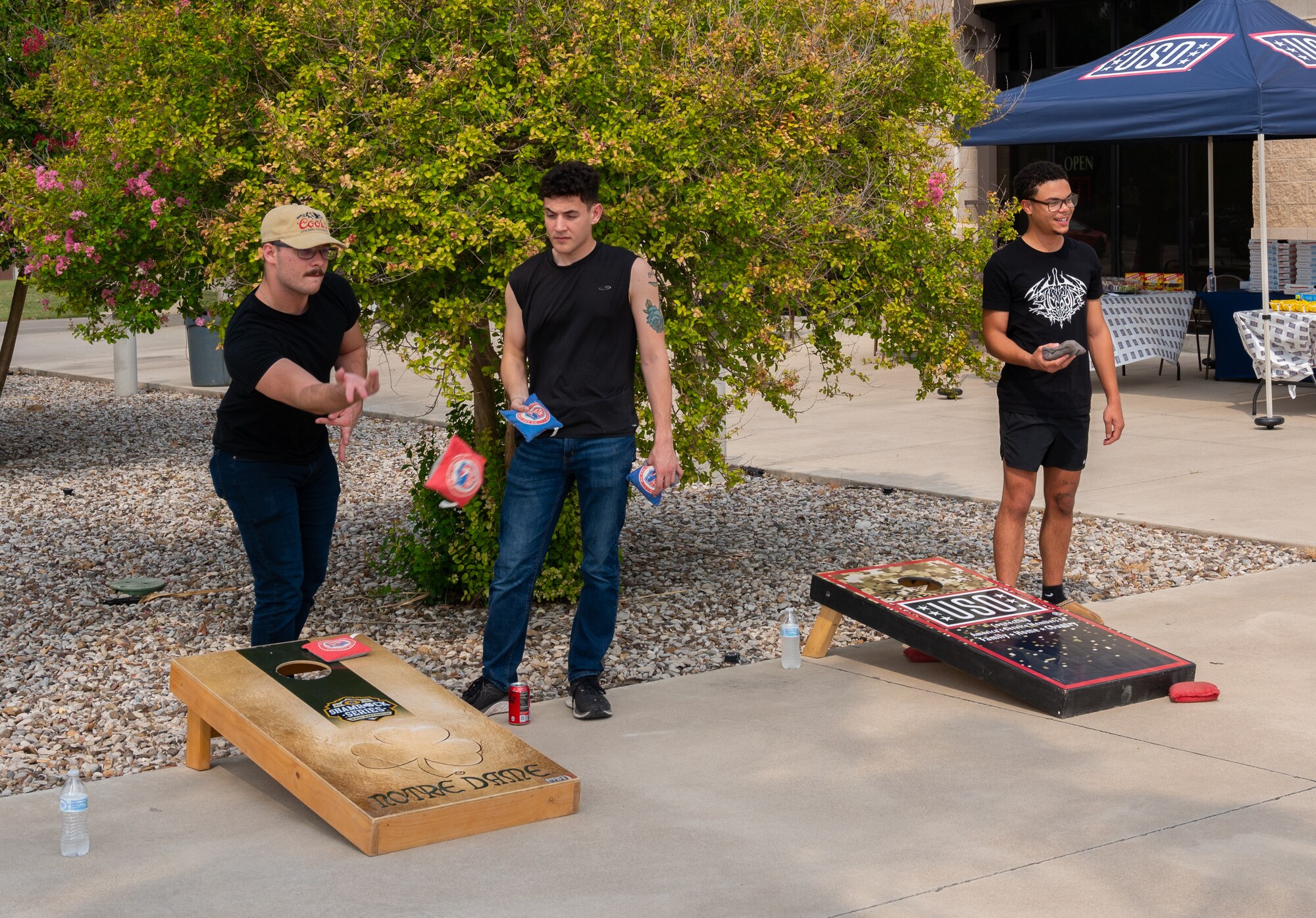 U.S. Air Force Airmen, get together to compete in gaming tournaments hosted by the USO outside the Losano Fitness Center on Laughlin Air Force Base, Texas, June 2, 2024. Friendly competition is one of the ways airmen can build camaraderie amongst each other. (U.S. Air Force photo by Airman 1st Class Harrison Sullivan)