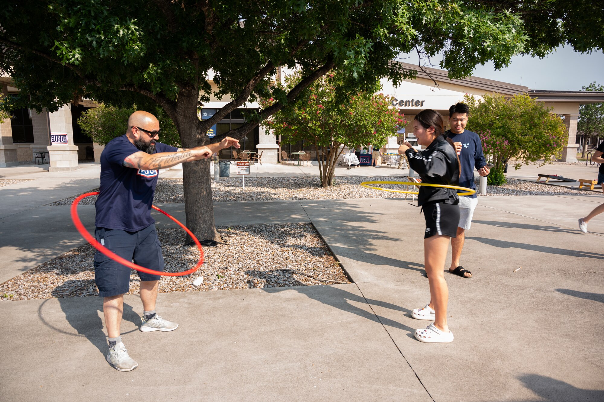 U.S. Air Force Airmen, get together to compete in gaming tournaments hosted by the USO outside the Losano Fitness Center on Laughlin Air Force Base, Texas, June 2, 2024. Friendly competition is one of the ways airmen can build camaraderie amongst each other. (U.S. Air Force photo by Airman 1st Class Harrison Sullivan)