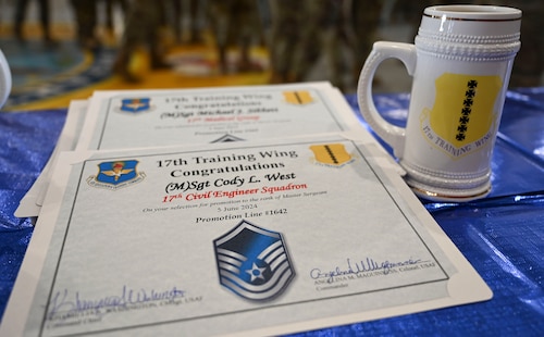 Promotion certificates lay on a table during a master sergeant release party at the Louis F. Garland Department of Defense Fire Academy, Goodfellow Air Force Base, Texas, June 5, 2024. Goodfellow congratulated 37 members for achieving this enormous career milestone as they prepare to assume senior non-commissioned officer’s duties. (U.S. Air Force photo by Airman 1st Class Madison Collier)