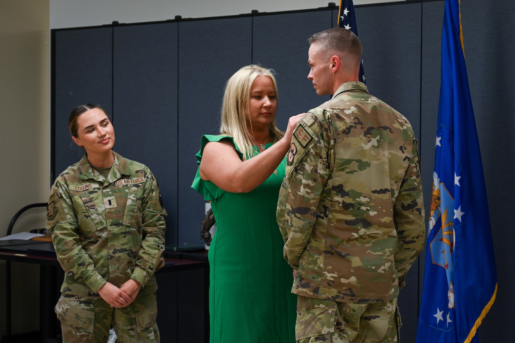 U.S. Air Force Master Sgt. Adam Neely, 97th Security Forces Squadron logistics readiness superintendent, is presented with the Meritorious Service Medal (MSM) by his wife, Shelly Neely, 97th Logistics Readiness Squadron commander’s secretary, and daughter, 1st Lt. Samantha Collins, 81st Medical Group practice manager, at Altus Air Force Base, Oklahoma, May 18, 2024. The MSM is a military award given to U.S. Armed Forces members who distinguish themselves with outstanding service or achievement to the country. (U.S. Air Force photo by Airman Lauren Torres)