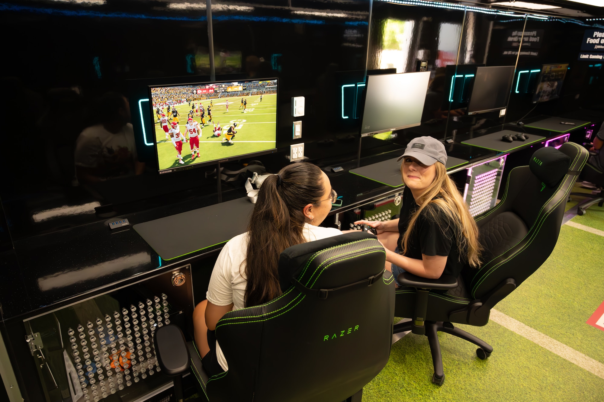 U.S. Air Force Airmen, get together to compete in gaming tournaments hosted by the USO outside the Losano Fitness Center on Laughlin Air Force Base, Texas, June 2, 2024. Friendly competition is one of the ways airmen can build camaraderie amongst each other. (U.S. Air Force photo by Airman 1st Class Harrison Sullivan)