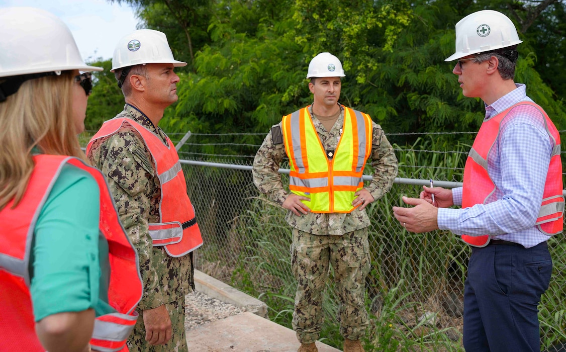 HALAWA, Hawaii (May 31, 2024) Adam Yost, right, National Security Advisor to Senator Mazie Hirono (Hawaii), Lt. Cmdr. Daniel Puckett, center, and Rear Adm. Marc Williams, deputy commander, Navy Closure Task Force-Red Hill (NCTF-RH) speak during a tour of the Red Hill Bulk Fuel Storage Facility (RHBFSF) in Halawa, Hawaii, May 31, 2024. Charged with the safe decommissioning of the RHBFSF, NCTF-RH was established by the Department of the Navy as a commitment to the community and the environment. (U.S. Navy photo by Mass Communication Specialist 1st Class Glenn Slaughter)